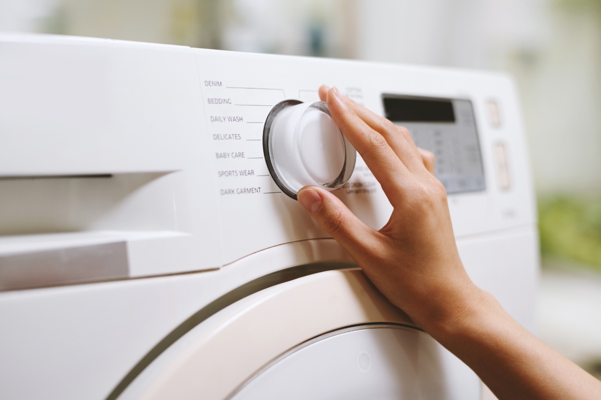 De vaak genegeerde knop op de wasmachine die de rekening meer dan halveert